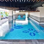 Modern Studio Room At Tamansari La Grande Apartment By Travelio